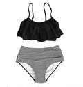 Women's conservative high-waisted swimsuit with ruffle detail and split bottom in polyester fabric