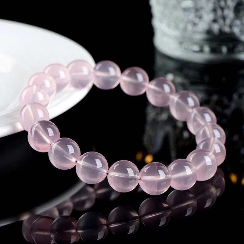 Natural starlight crystal round bead bracelet for women in pink with multiple size options