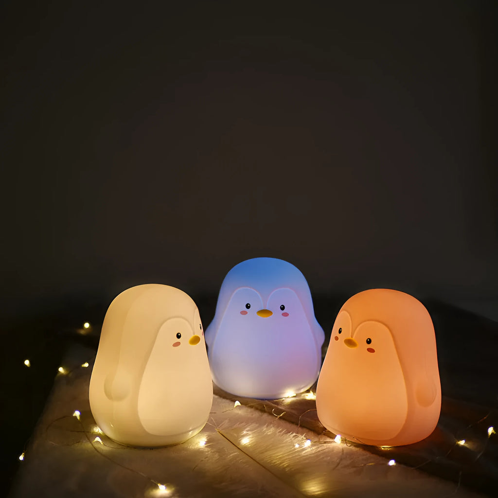 Penguin-shaped USB rechargeable night light with white LED illumination, measuring 118x110x132mm