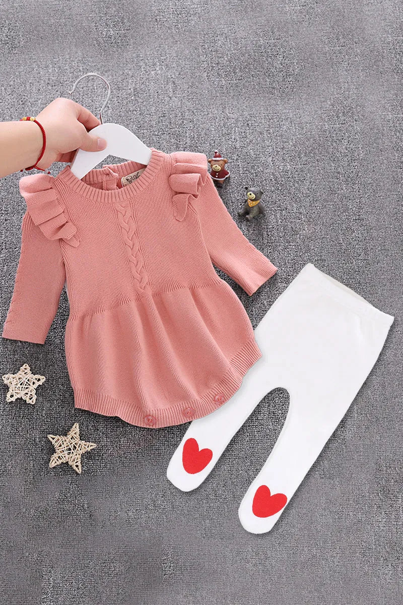 Baby girl's pink cotton princess romper with placket closure