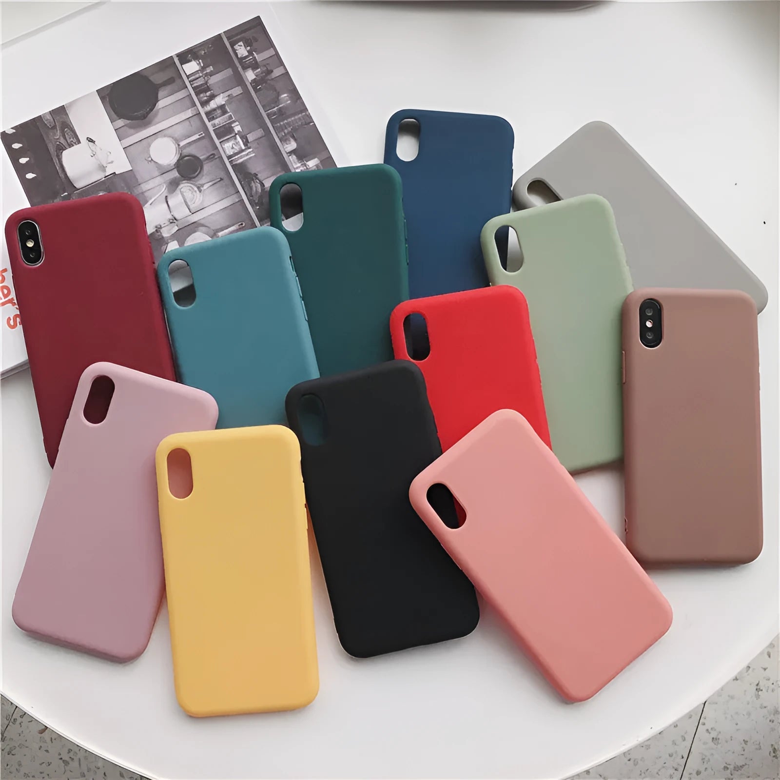 Silicone phone case for iPhone XR and XS Max shown in various colours.