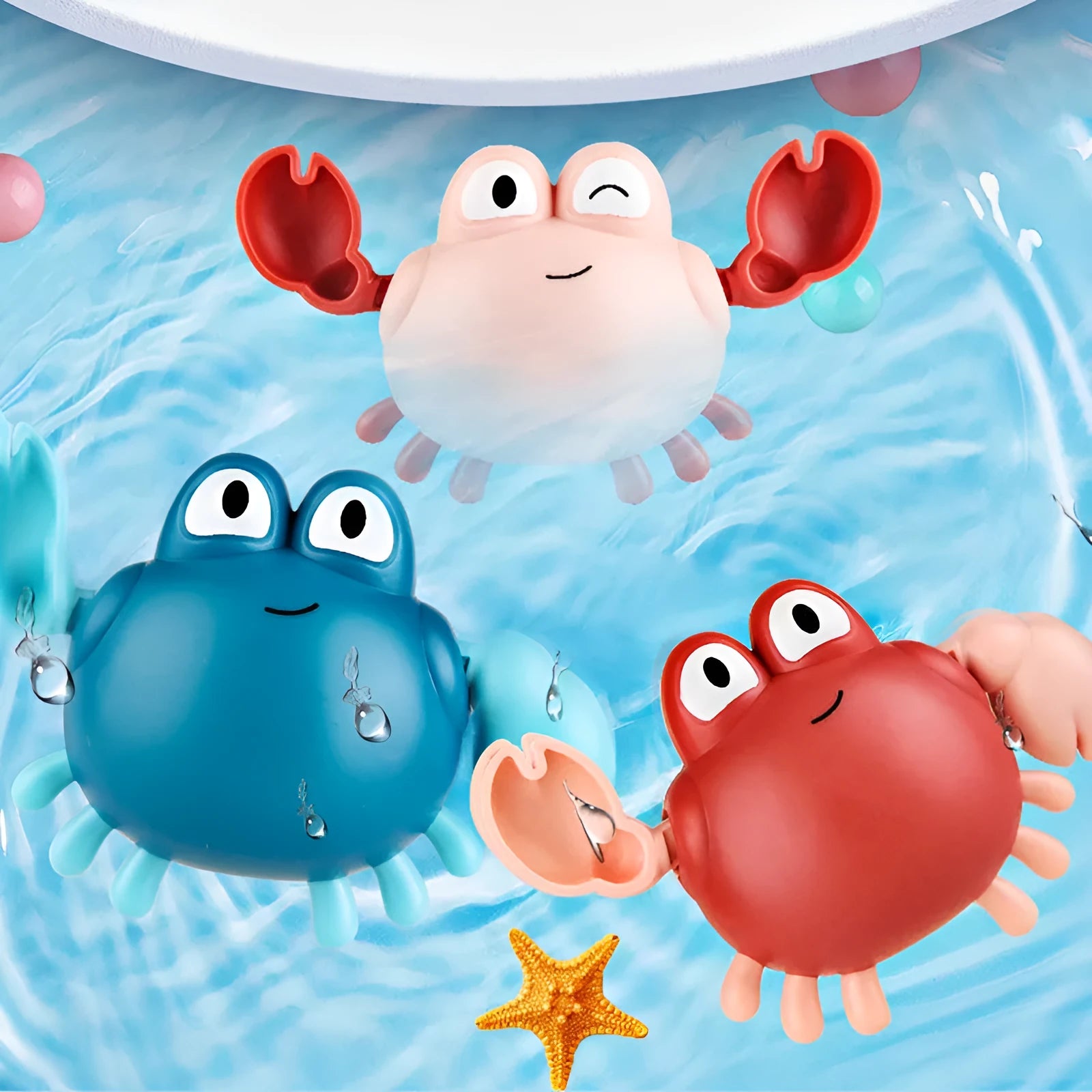 Clockwork crab and turtle bath toys floating on water – pink and blue options