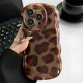 Brown leopard print silicone iPhone case with leather wristband, anti-fall, compatible with iPhone 11 to 15 Pro Max