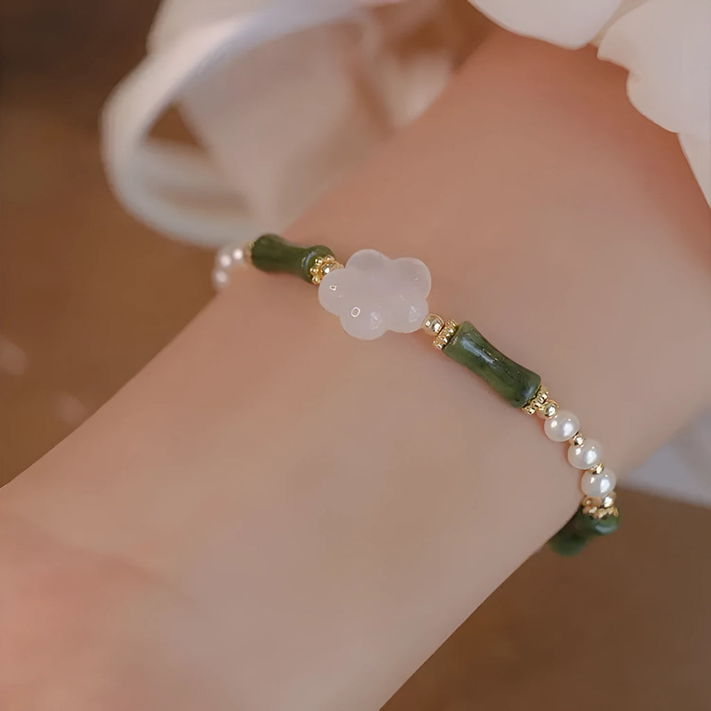 Women's Chinese style Hetian jade bracelet with bamboo joint design and shell pearl beads
