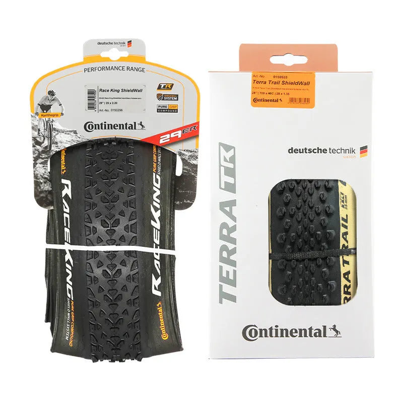 Mountain bike folding tyre shown in yellow and white, next to size options 26, 27.5 and 29 inches.
