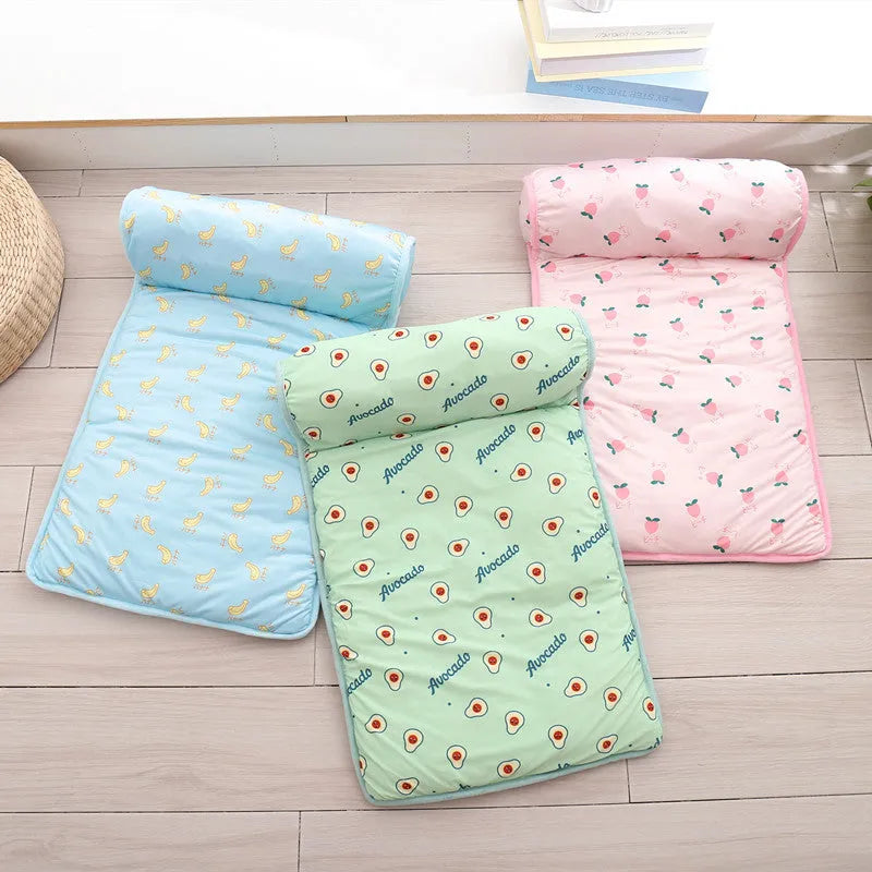 Ice silk cooling pet mat with pillow, non-slip bottom, in pink cherry, blue banana, or green avocado.