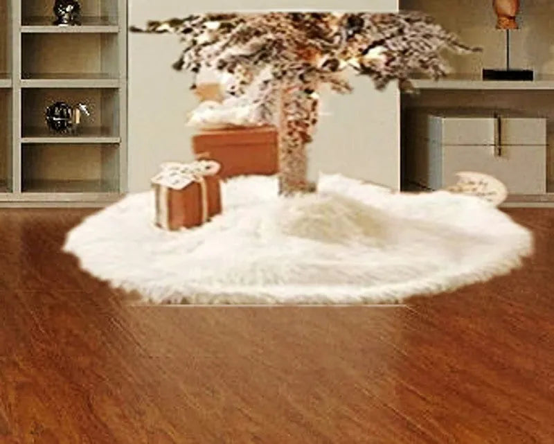 White plush Christmas tree skirt placed around base of decorated Christmas tree, 122cm size