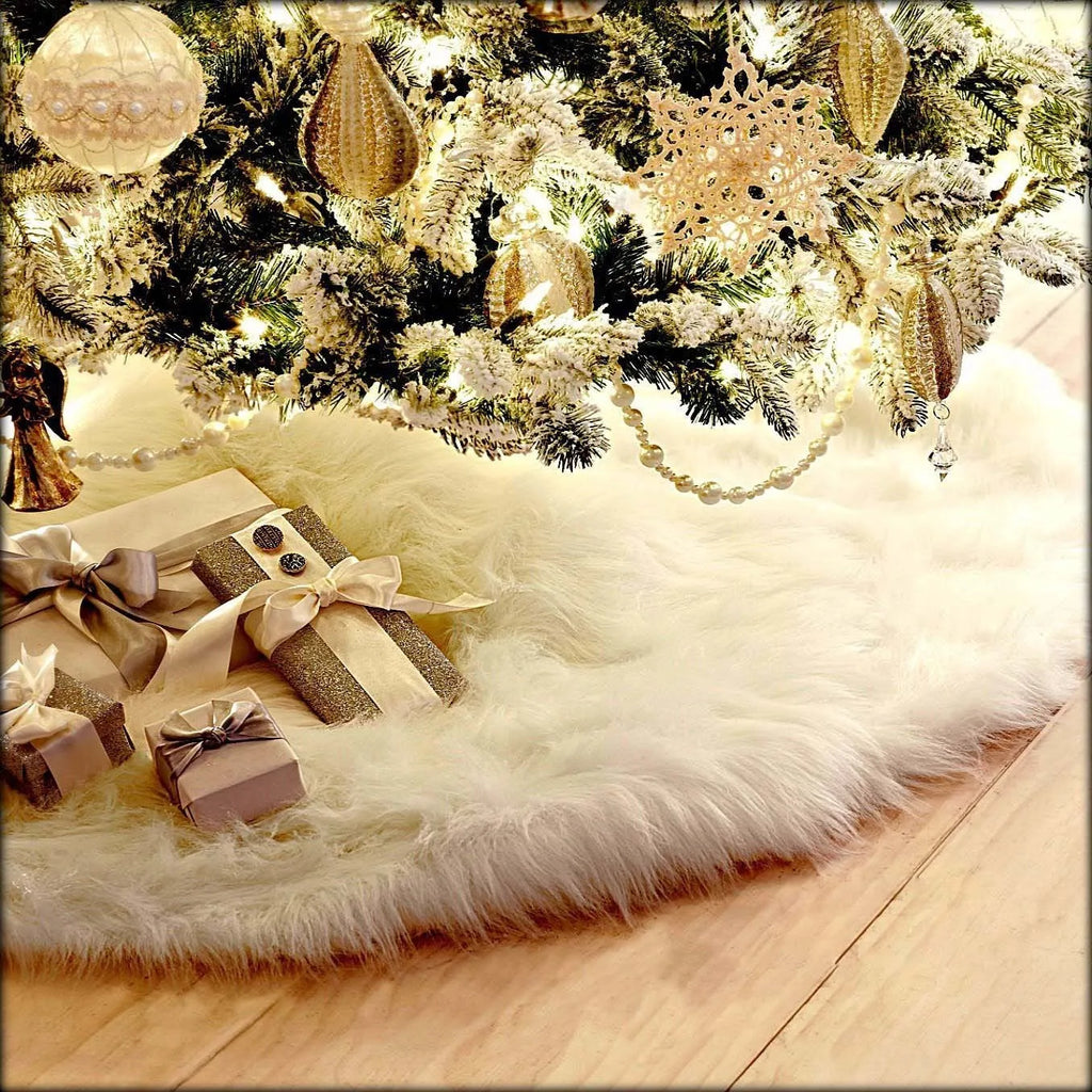 White plush Christmas tree skirt placed around base of decorated Christmas tree, 122cm size