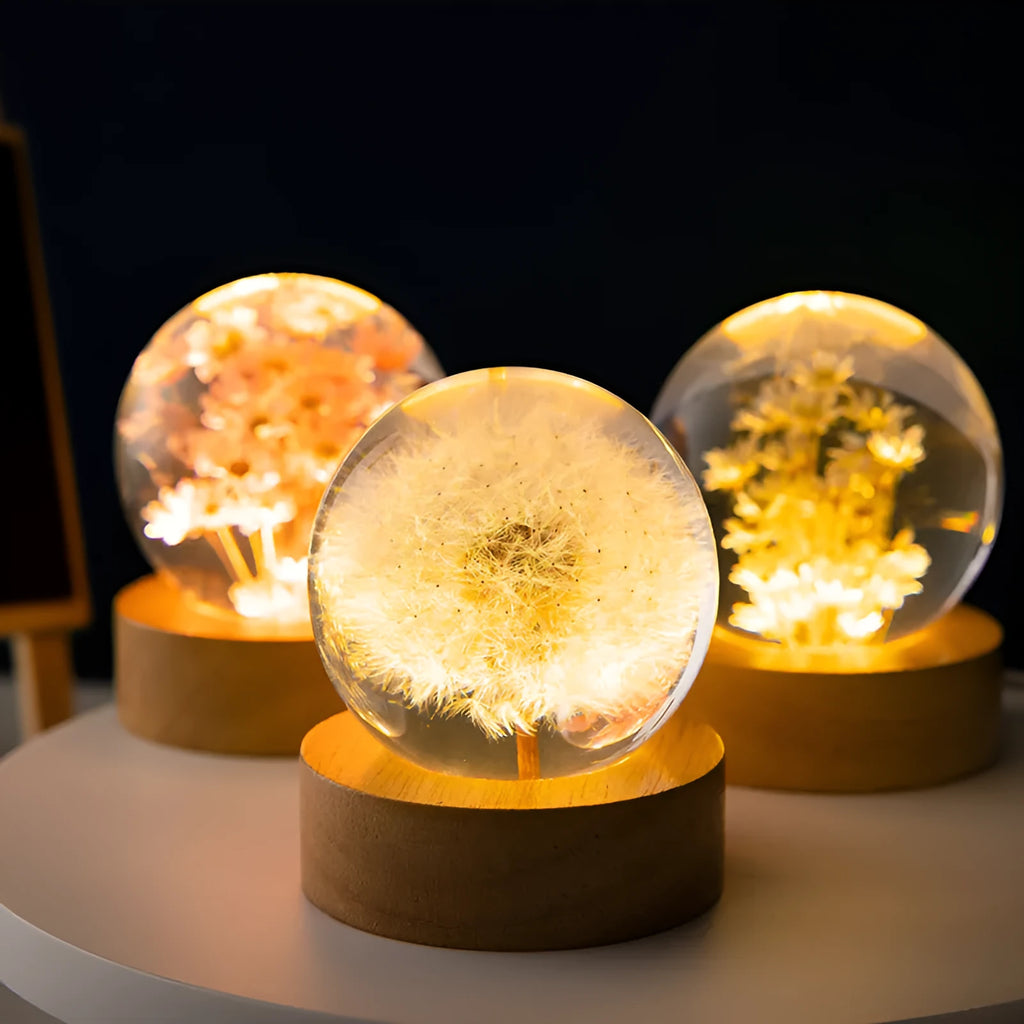 3D dandelion flower inside a 60mm clear crystal ball night light on a beech wood stand