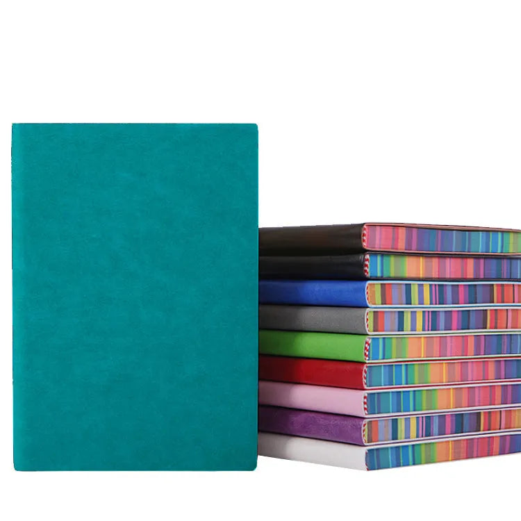 Rainbow side A5 notebook with PU leather back cover and 100g Daolin paper, black colour option, on a flat surface