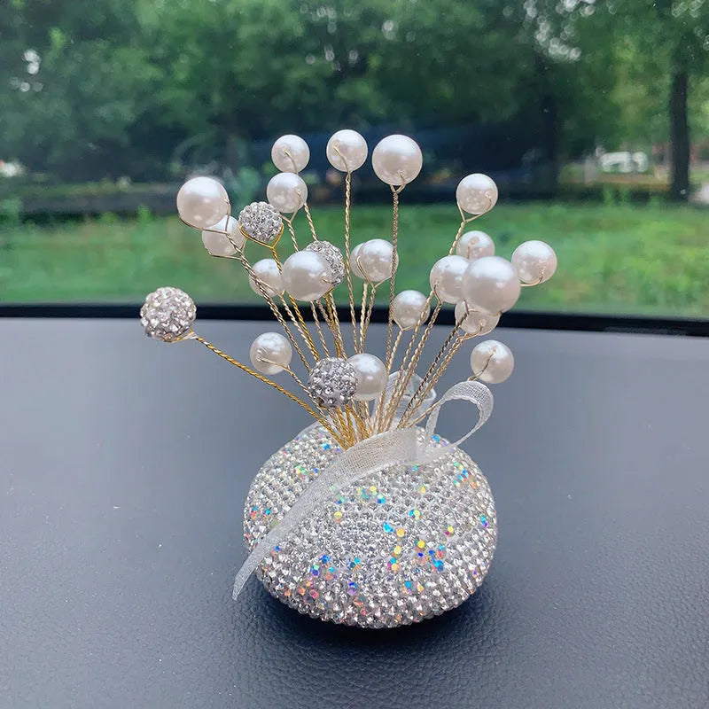 Clay diamond star decoration ornament for a car centre console in a modern colour design.