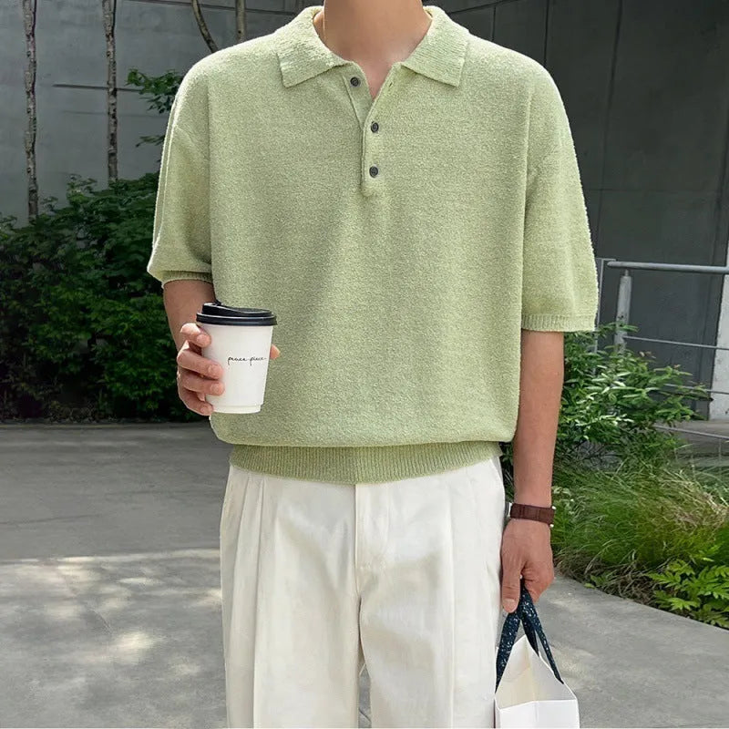 A caramel-colour men's retro knitted polo shirt with short sleeves and an asymmetric design detail on the front.
