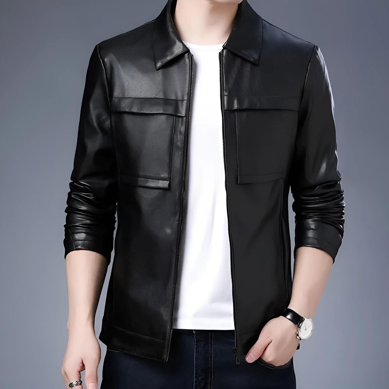 Men's slim lapel artificial leather jacket in black with side pockets and polyester lining