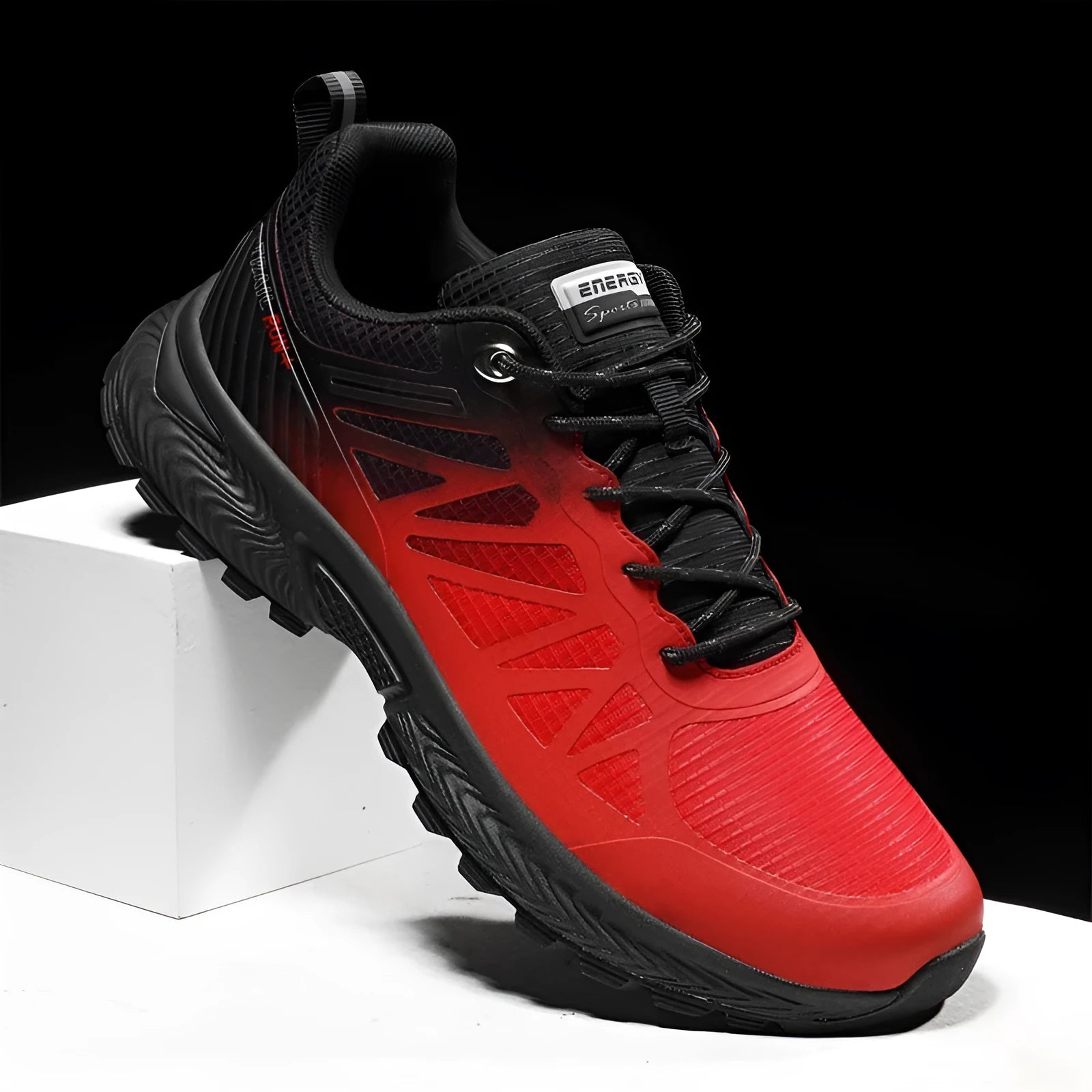 Men's black and grey breathable mesh running shoes with a lace-up front and rubber sole.