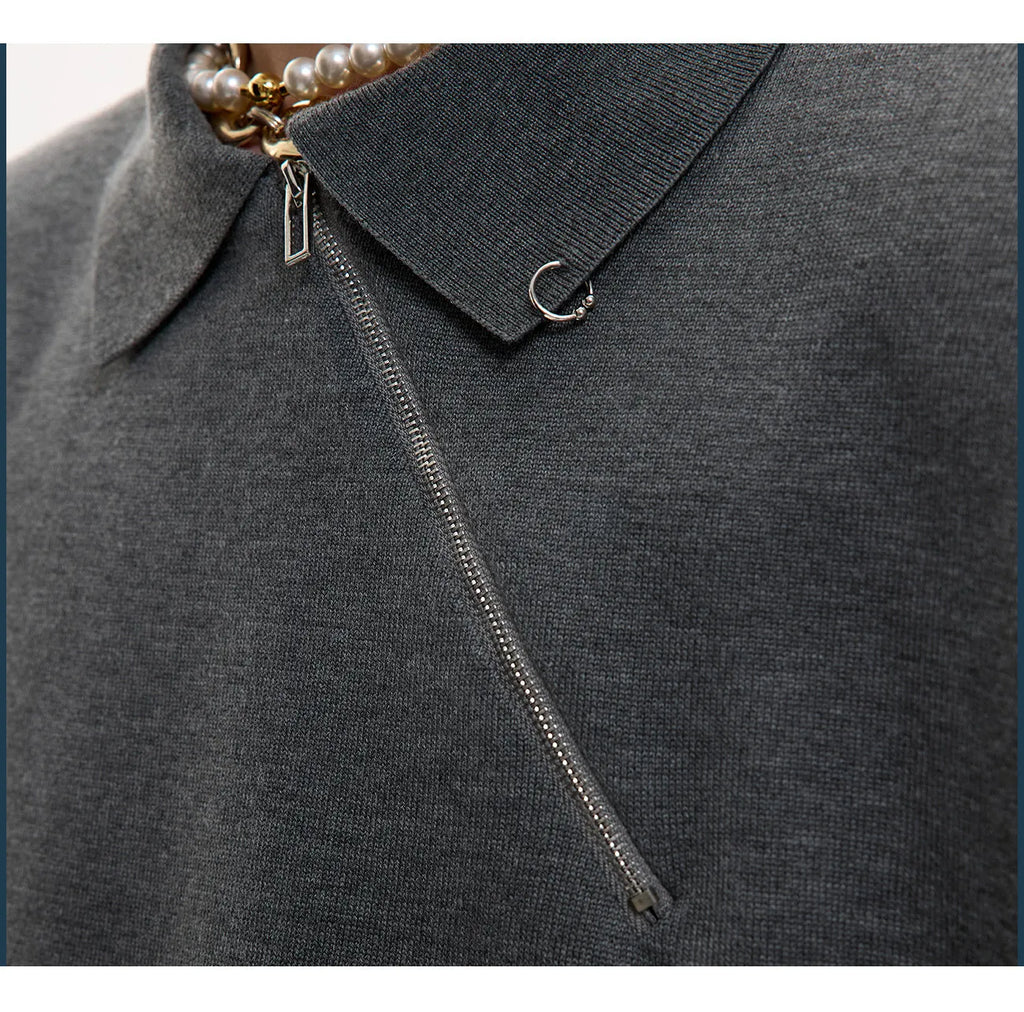 Man wearing a slim-fit grey knitted polo shirt with an oblique front zipper and lapel collar