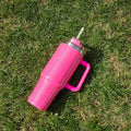 A large stainless steel vacuum insulation cup in a gradient colour finish, showing its height and wide mouth.