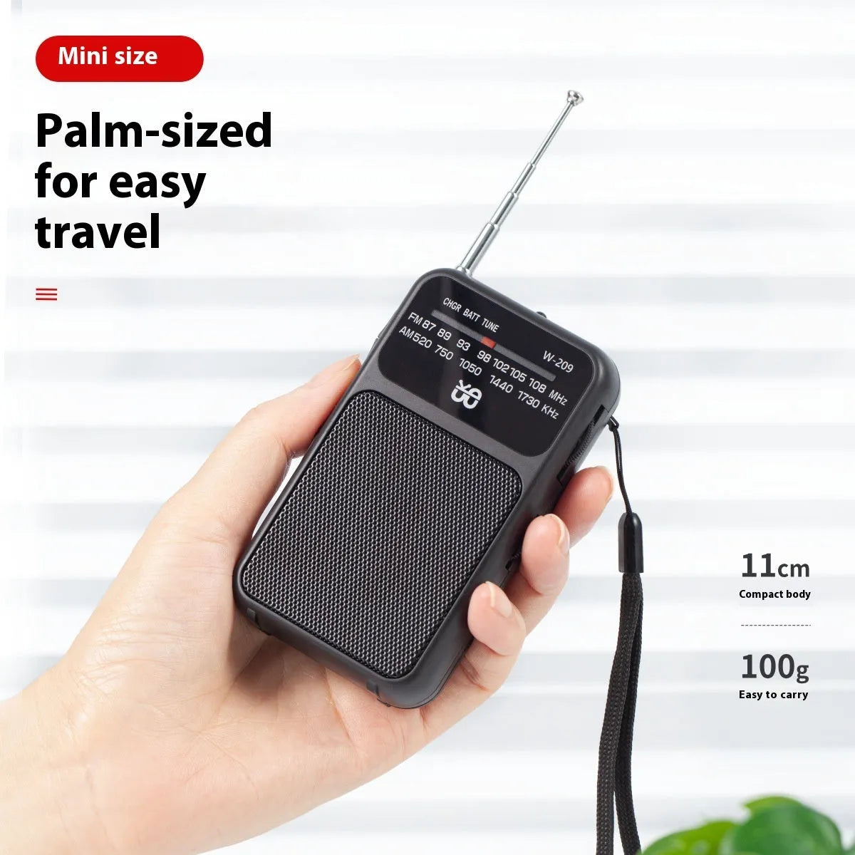 Portable FM/AM pocket radio in black with built-in flashlight, ABS construction, 110x60x27mm