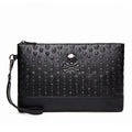 Retro men's and women's skull clutch bag in black, waterproof PU leather, geometric pattern, handheld style