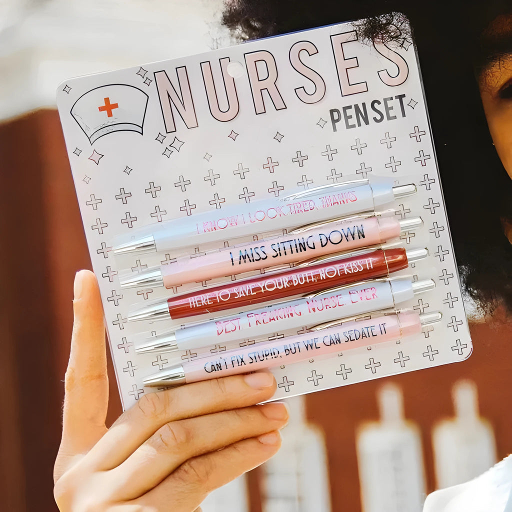 Five nurse-themed ballpoint pens with retractable mechanisms and printed medical copywriting