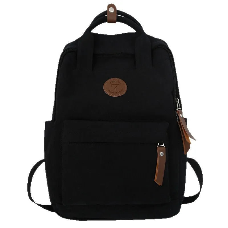 Black Oxford cloth fashion backpack with curved shoulder straps for burden reduction