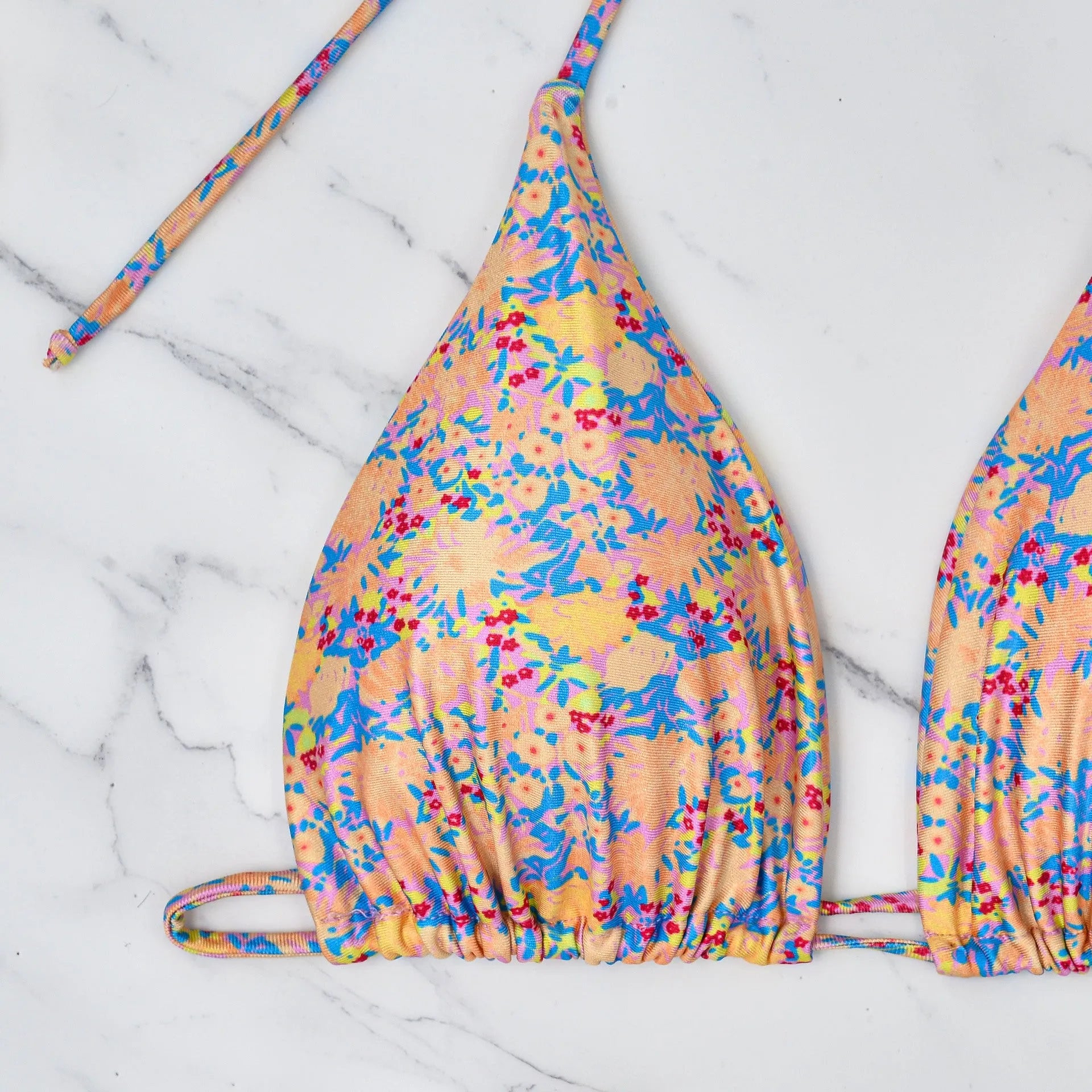 Women's lace-up bikini set in polyester for swimming, showing backless design.