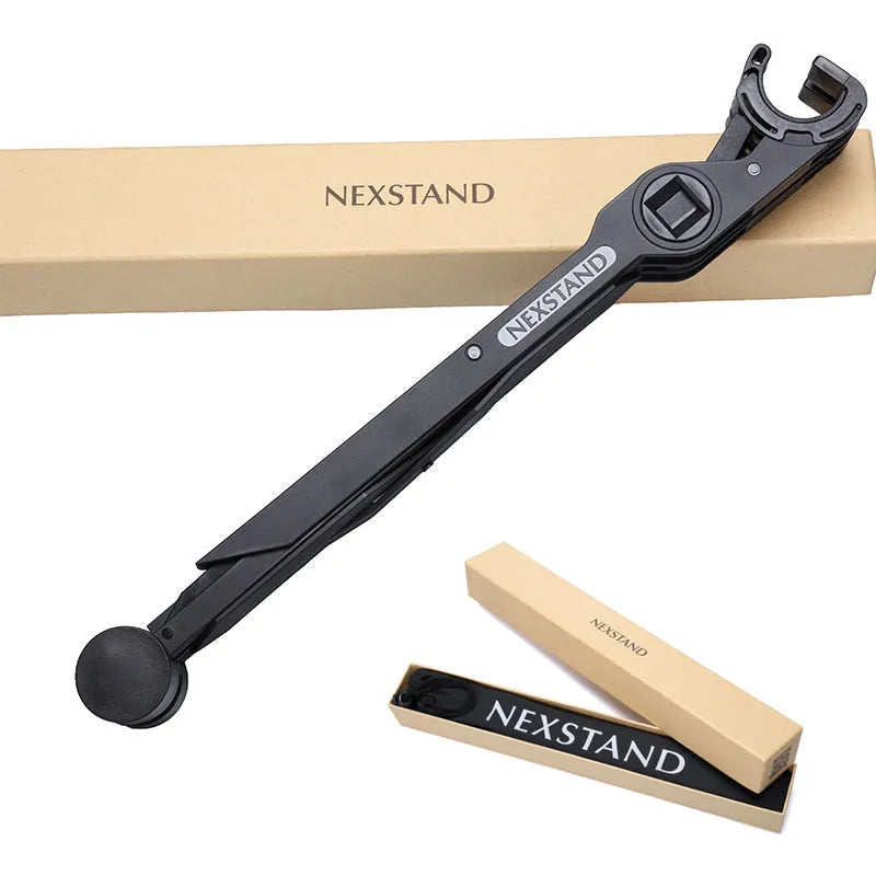 Sagacious black foldable laptop stand made of enhanced nylon, shown open and next to its portable carry bag.