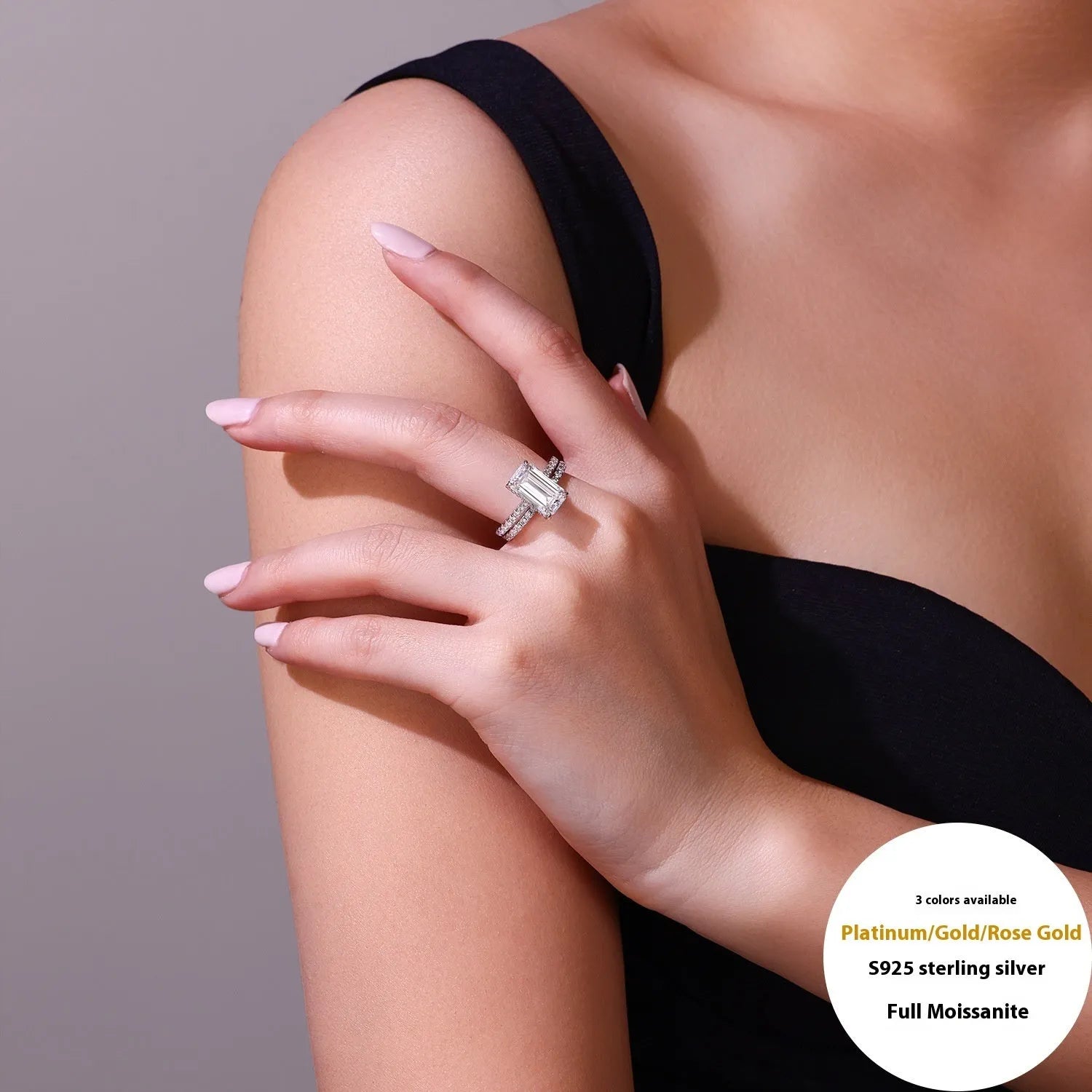 Pair of matching geometric S925 sterling silver rings with white finish on a flat surface