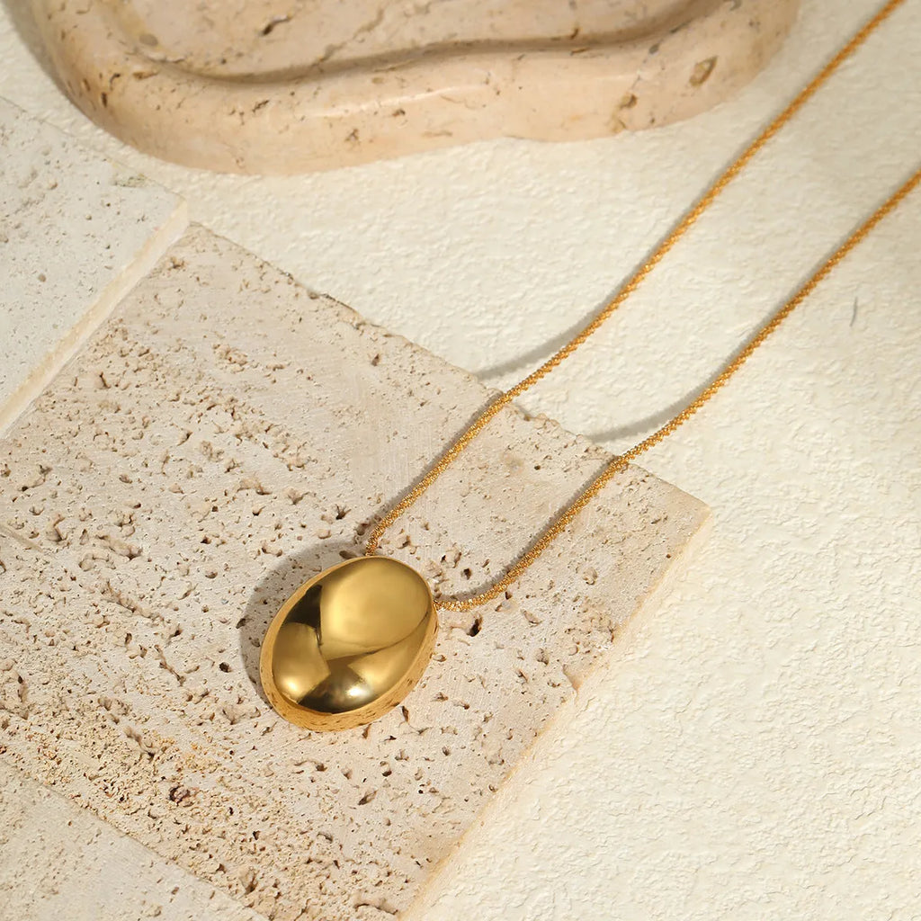 Gold geometric pendant necklace on stainless steel chain with adjustable 41-50cm length