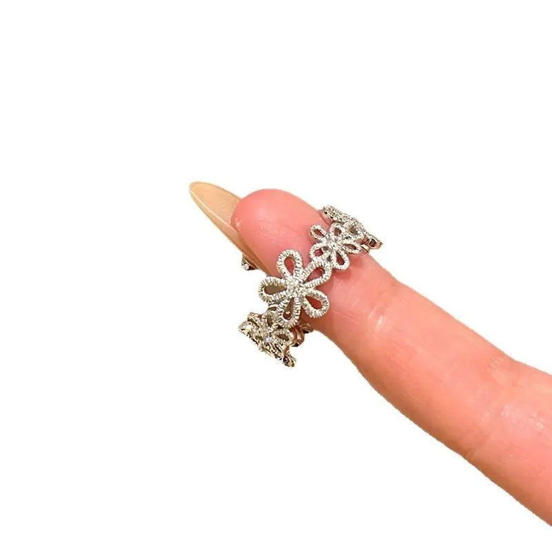 Silver Flowers lace hollow flower ring for women, electroplated metal geometric floral design
