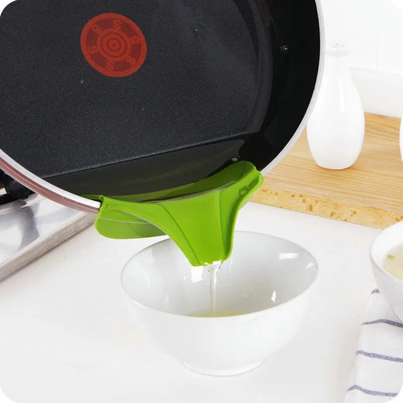 Green silicone soup funnel kitchen gadget showing flexible food-grade material and clip-on design