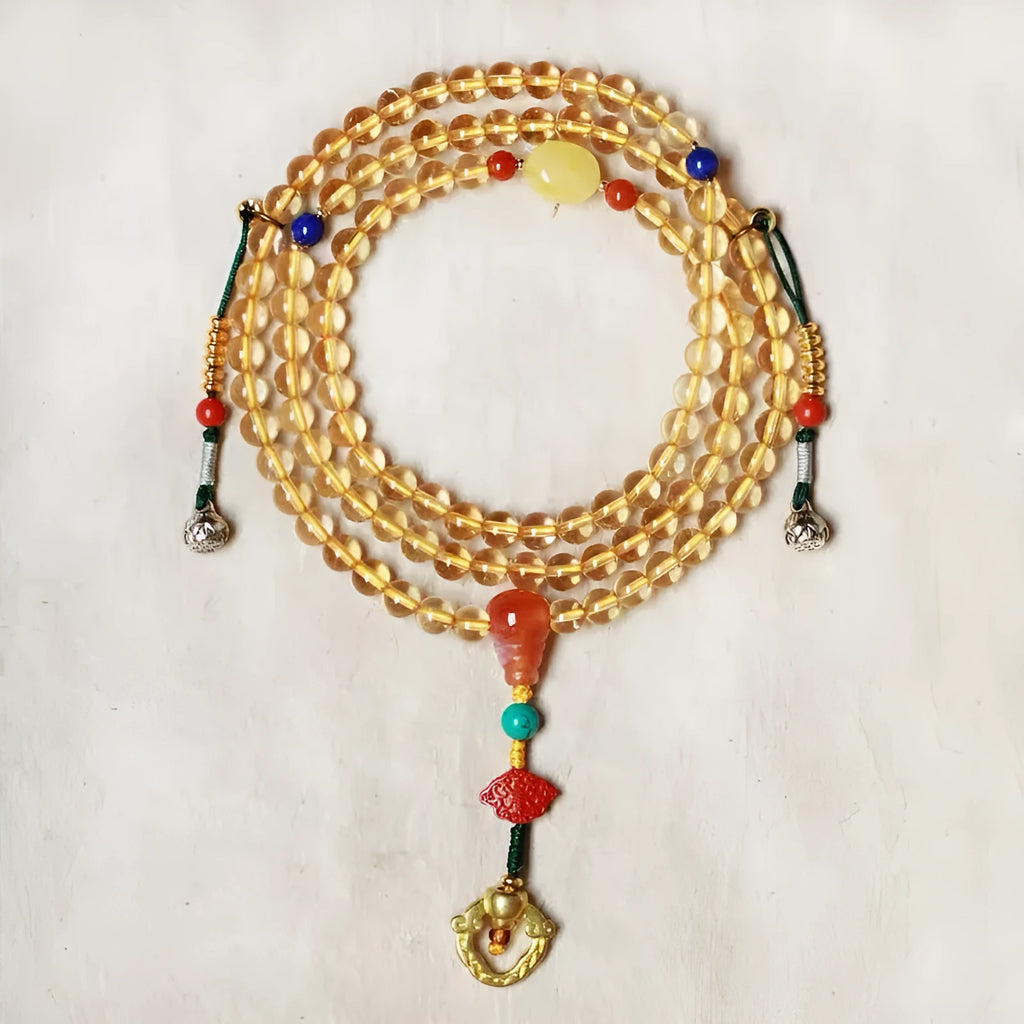 Close-up of a yellow natural citrine bracelet with 1mm beads on a filament string.
