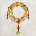 Close-up of a yellow natural citrine bracelet with 1mm beads on a filament string.