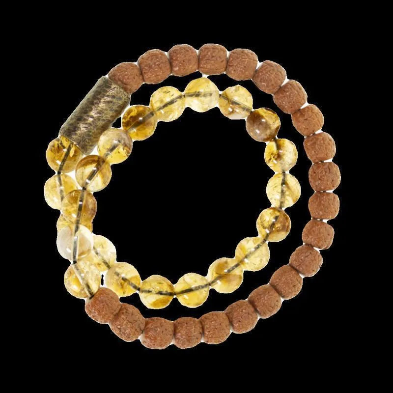 Personalised natural colour LCD double circle bracelet in citrine on a wrist.