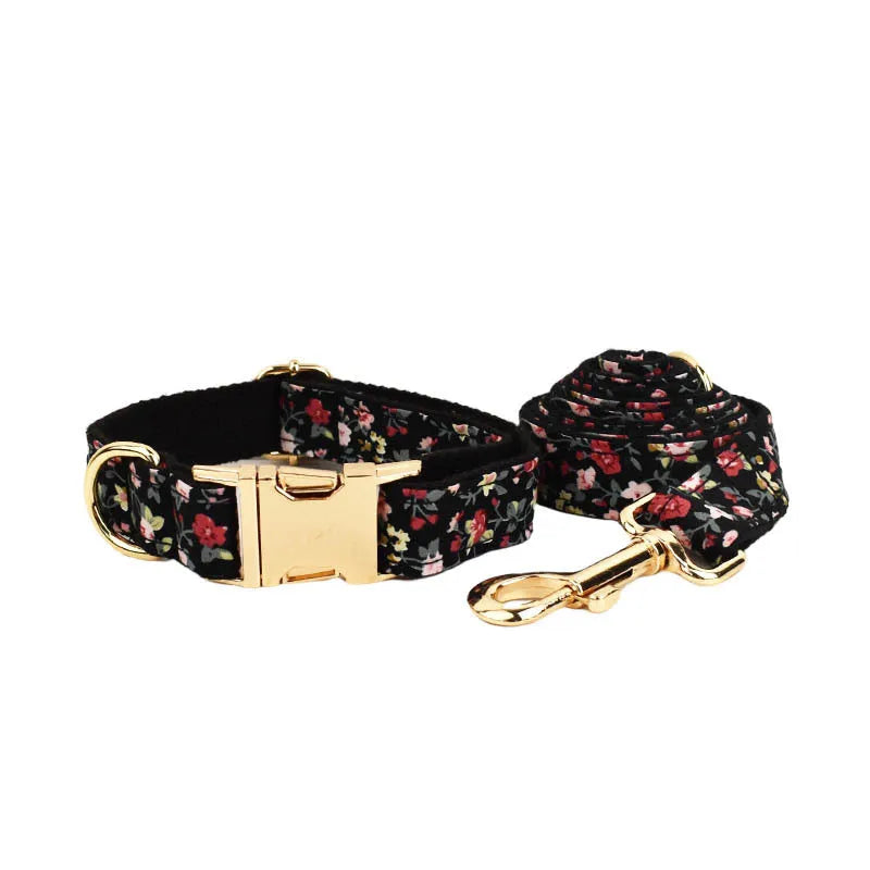 Four-piece pet accessory set with dog collar, leash, removable bow, and printed vest in cloth material