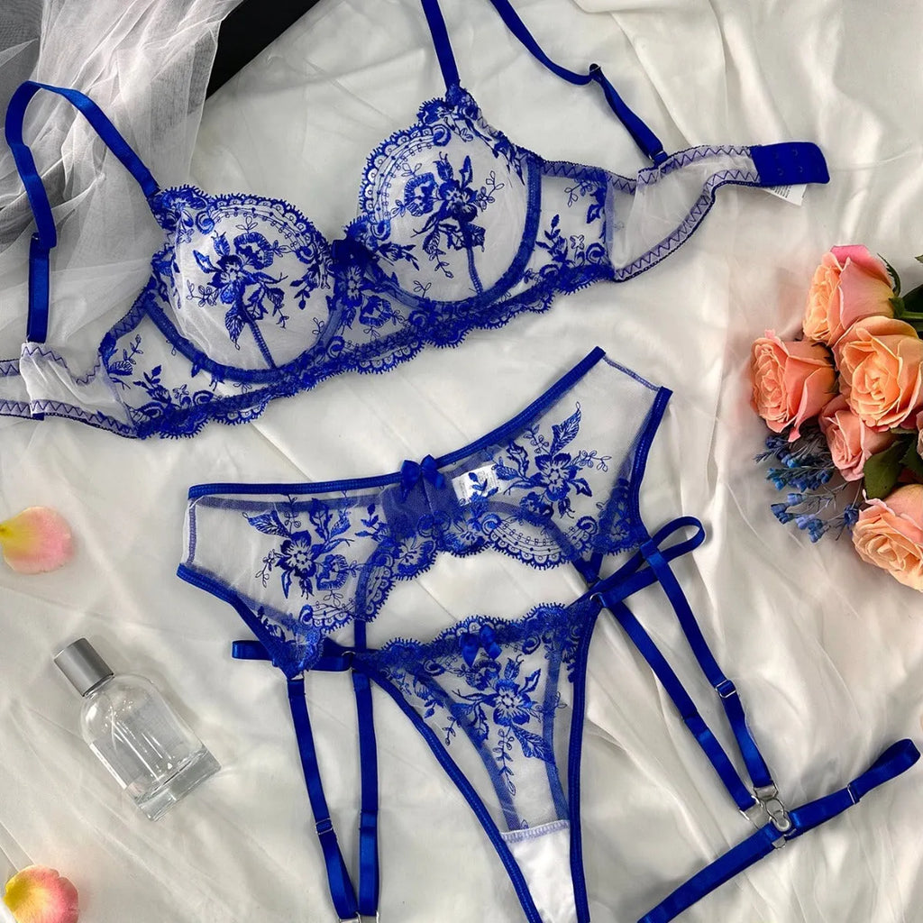 Sapphire blue women's see-through cutout underwear set with matching thong and garters