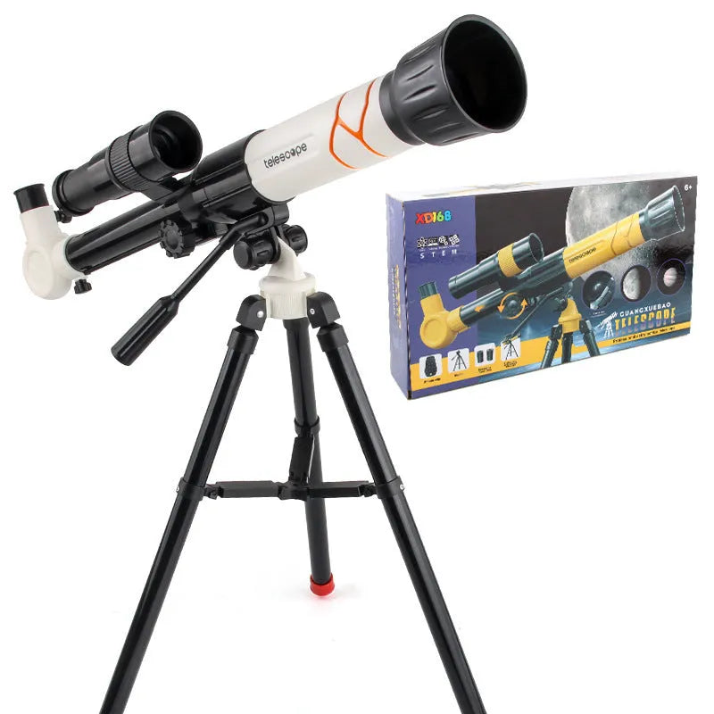 White kids astronomical telescope on tripod with smartphone attached for celestial observation