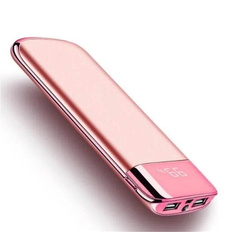 Black portable power bank with LCD display showing battery percentage and two USB ports