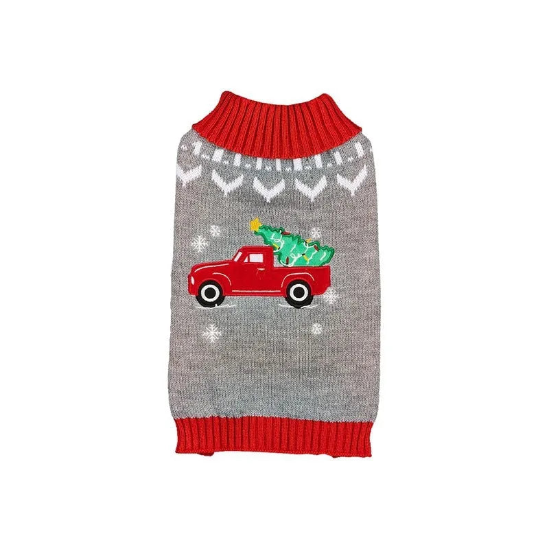 Pet dog wearing acrylic knit Christmas costume with red Santa hat and white snowflake pattern on a white background