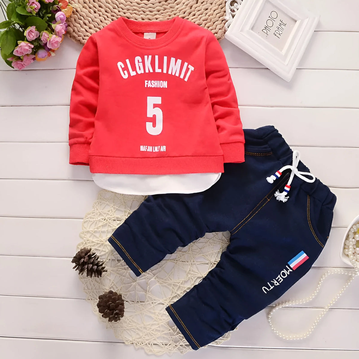 Boys red cotton tracksuit two-piece set with long sleeves and letter print on white background