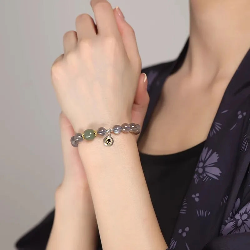 Birth Buddha Beads bracelet with 8mm moonstone crystal beads featuring Thousand-Hand Kwan-yin mouse zodiac modelling