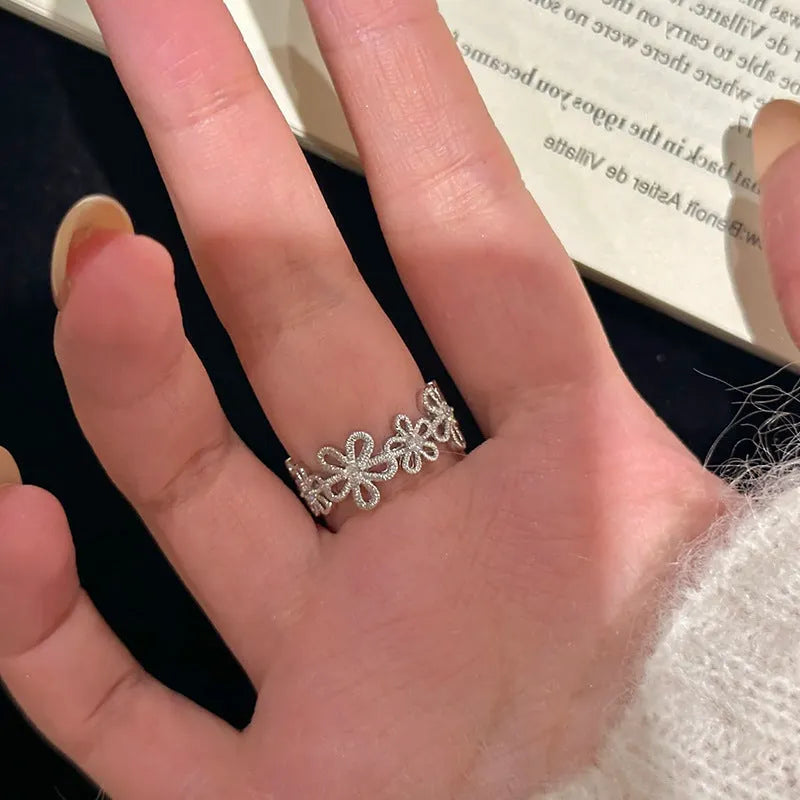 Silver Flowers lace hollow flower ring for women, electroplated metal geometric floral design
