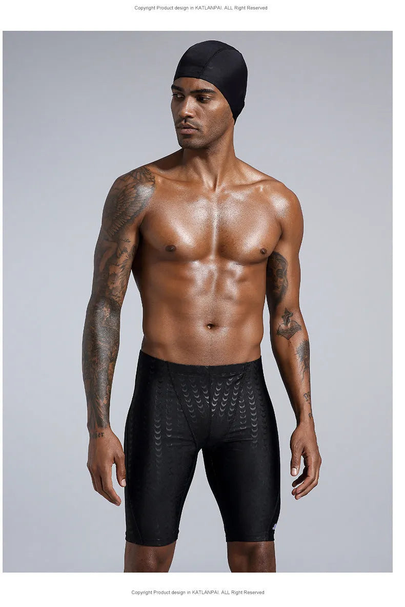 Men's solid colour swimming trunks in waterproof polyester fabric available in larger sizes