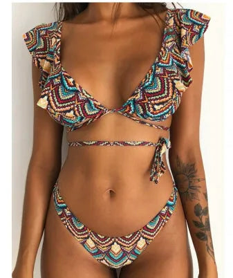 Yellow floral split print bikini swimsuit with triangle top on mannequin