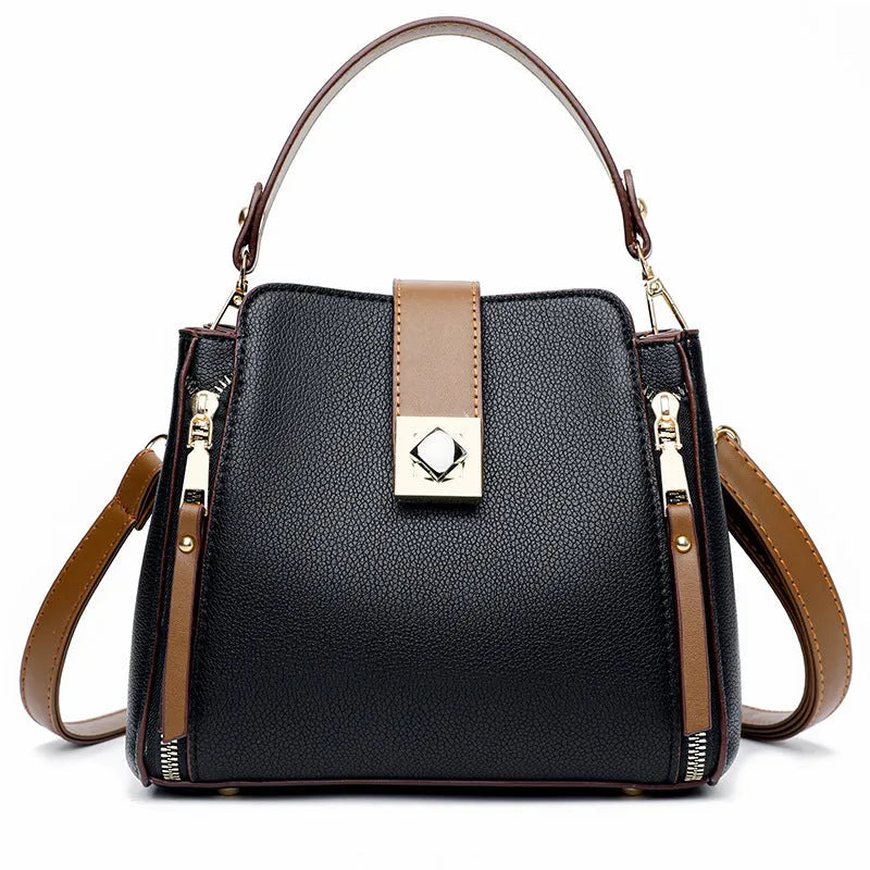 Women's large-capacity PU crossbody bucket bag with three-dimensional outer pocket and splicing detail, shown in black, red, or blue