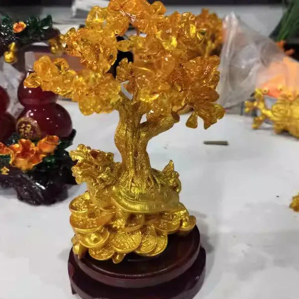 Citrine-coloured resin small water turtle money tree Feng Shui ornament.