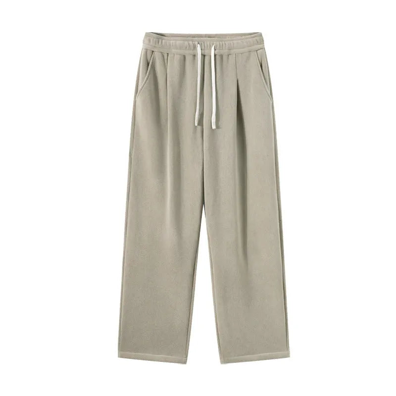 Men's apricot coloured double-sided polar fleece casual trousers with a loose fit and drawstring waist.