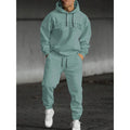 Men's loose-fit casual sweater suit with letter print in black, showing top and matching pants.