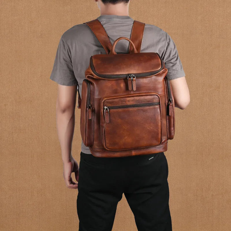 Genuine leather 14 inch men's backpack in light brown with retro patchwork and polyester cotton lining