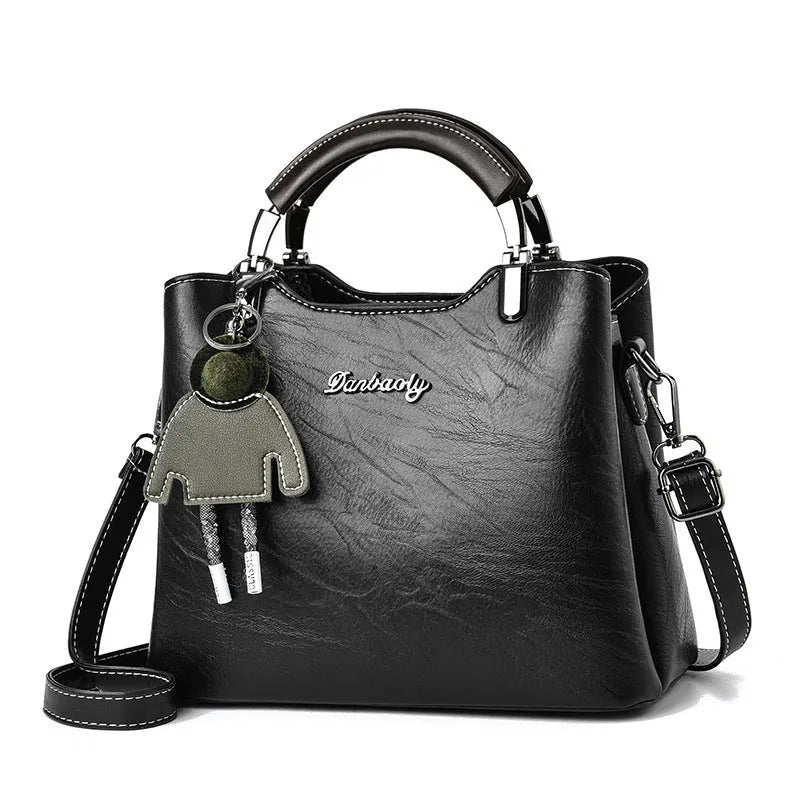 Simple Retro small horizontal square PU crossbody handbag for women in black with outer slit pocket