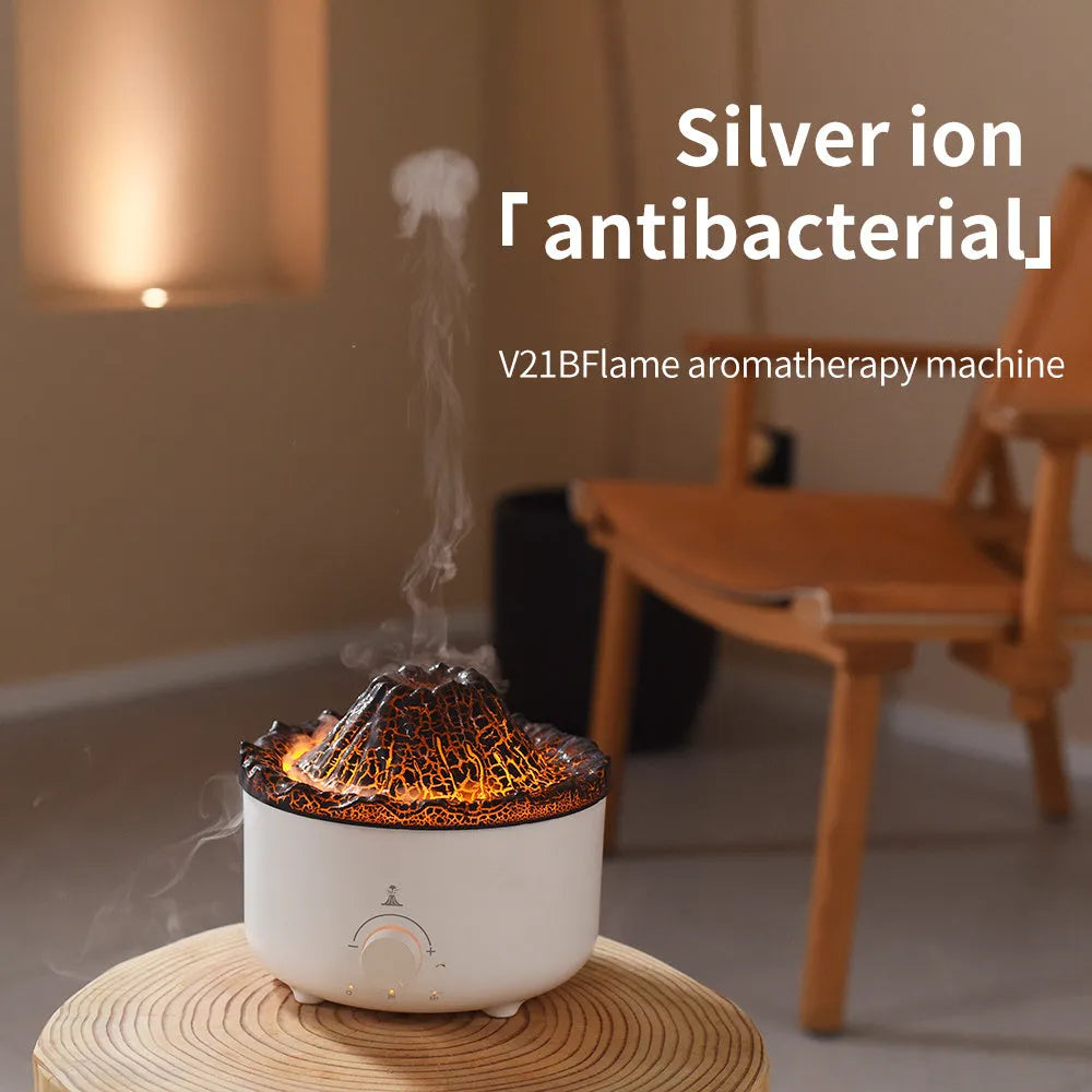 White simulated flame volcano humidifier with remote control showing orange and blue lighting effects
